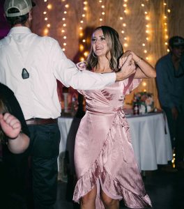 Young girl dancing at reception