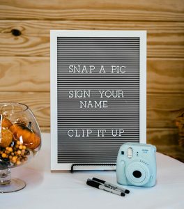 Sign you name at wedding and take a photo