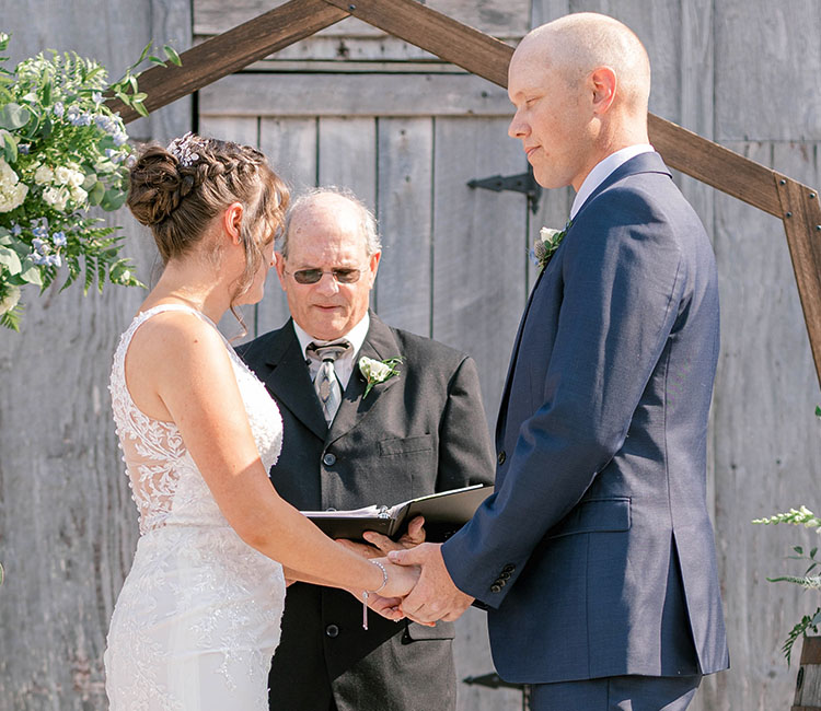 Wedding Couple in Front of Barn