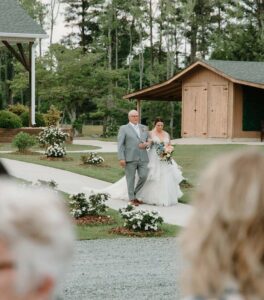 Father and bride walking the aisle