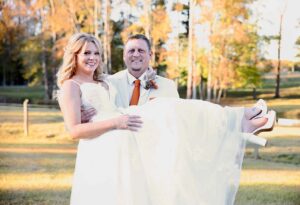 Groom Holding Bride